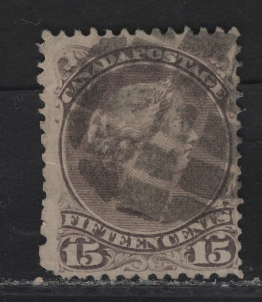 Lot 35 (C) Canada #29a 15c Grayish Purple Queen Victoria, 1868-1876 Large Queen Issue, A Good Used Single, Mid Montreal Printing, Segmented Cork Cancel, Paper MM-X, Perf 11.5x12, Re-Perforated In The Left Margin & Rounded LL Corner.