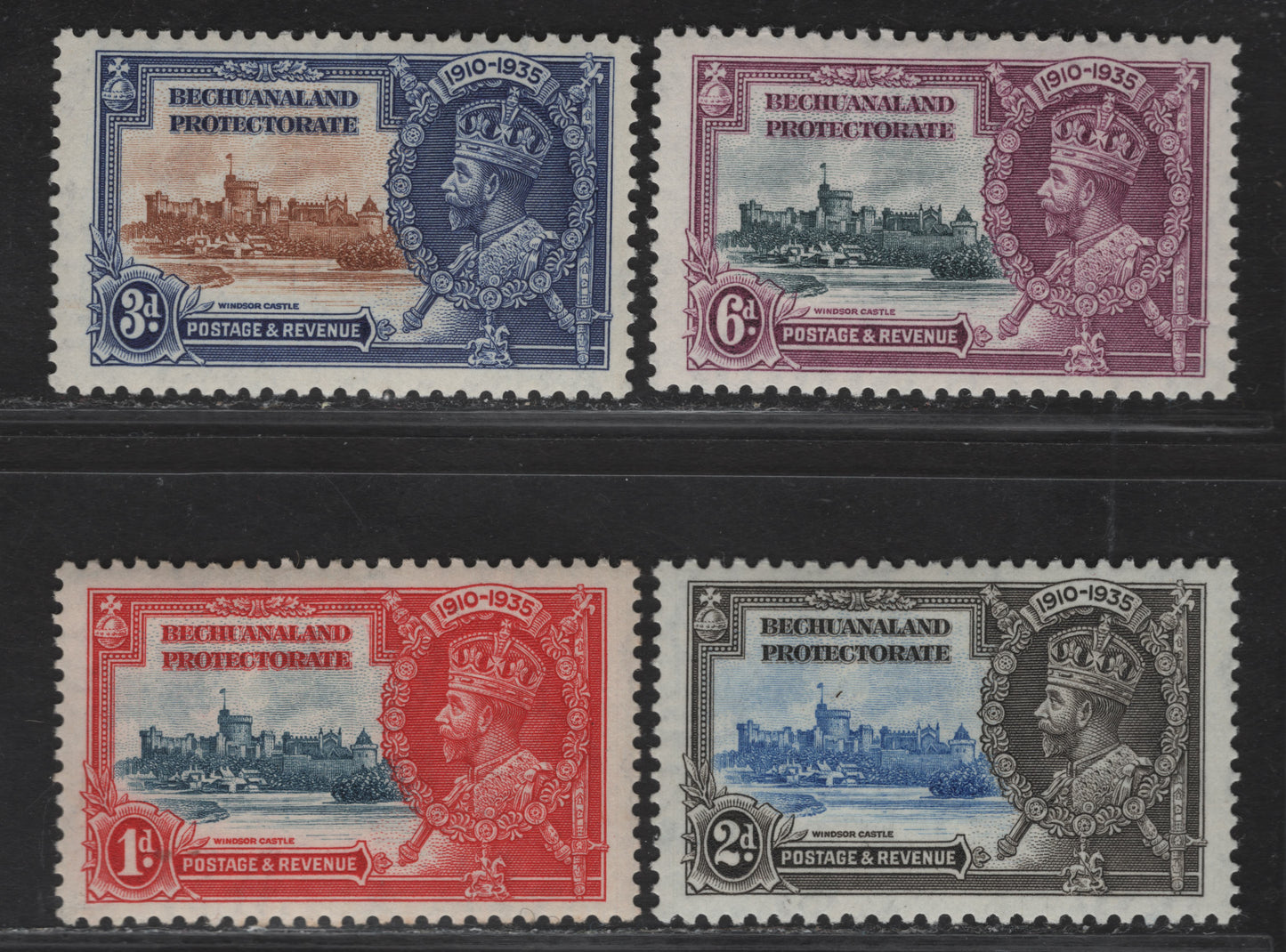 Lot 226 Bechuanaland Protectorate SG#111-114 1d - 6d Deep Blue & Scarlet - Slate & Purple Windsor Castle, 1935 Silver Jubilee Issue, 4 VFOG Singles, Fine/Very Fine Hinged Set