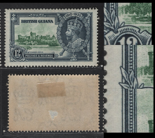 Lot 256 British Guiana SG#303var 12c - 24c Green & Indigo Windsor Castle, 1935 Silver Jubilee Issue, A VGOG Single, Re-Entry Of Frame Plate, Showing Doubling Along Inner Left Framelines, The Tips Of The Radial Lines In The Shield