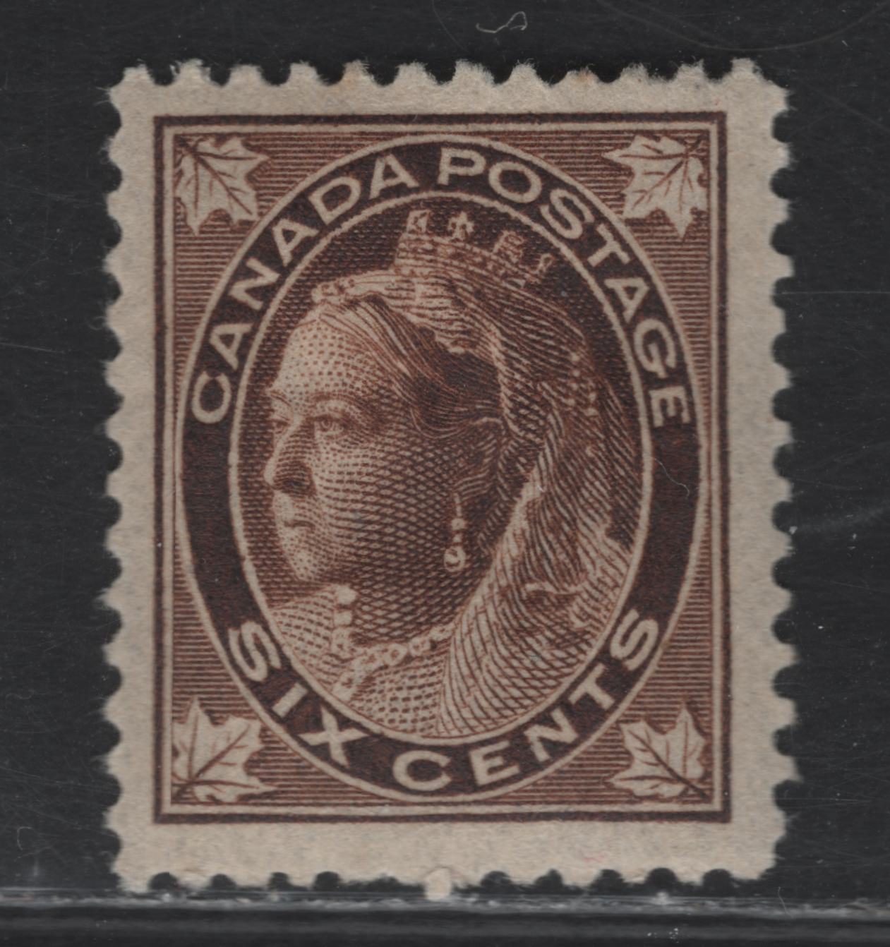 Lot 112 (C) Canada #71 6c Dark Yellowish Brown Queen Victoria, 1897-1898 Maple Leaf Issue, A VFOG Single, Paper ABN-Z, Perf 11.9, Design Size 17x12mm.