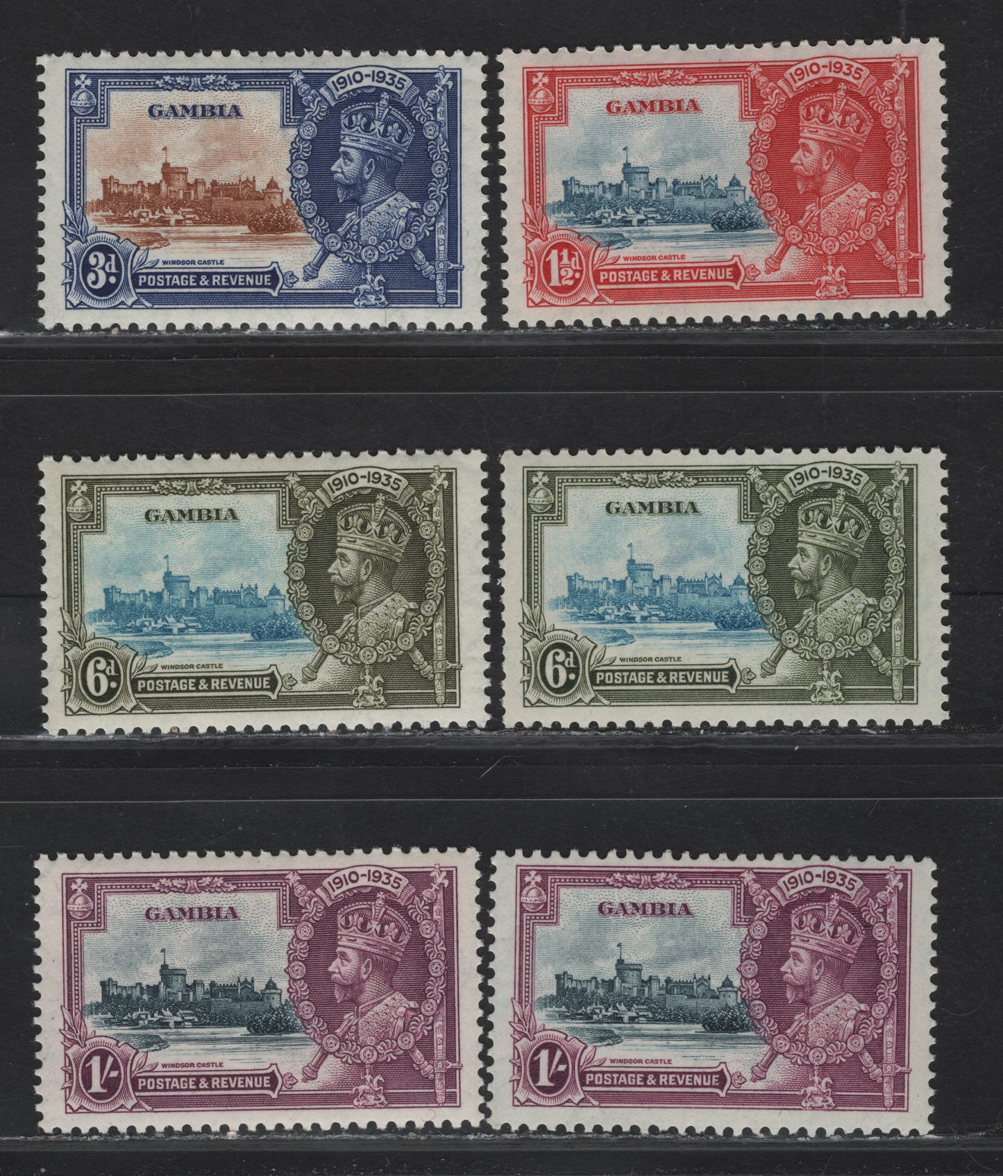 Lot 267 Gambia SG#143-146 1.5d - 1/- Dull Blue & Deep Scarlet - Slate & Rose Purple KGV & Windsor Castle, 1935 Silver Jubilee Issue, 6 VFNH Singles, Includes 2 Different Frame Plate Shades Of The 6d & 1/-