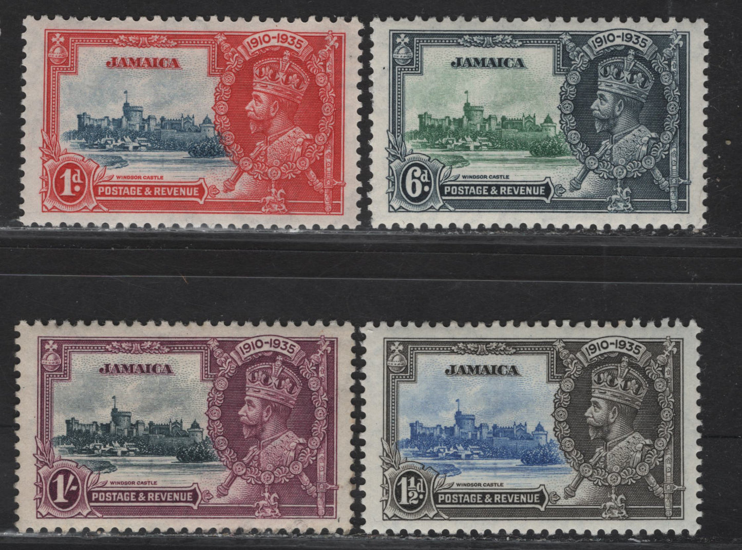 Lot 143 Jamaica SG#114-117 1c - 1/- Deep Gray Blue & Scarlet - Slate & Purple KGV & Windsor Castle, 1935 Silver Jubilee Issue, 4 VFOG Singles, Basic Mint Hinged Stamp