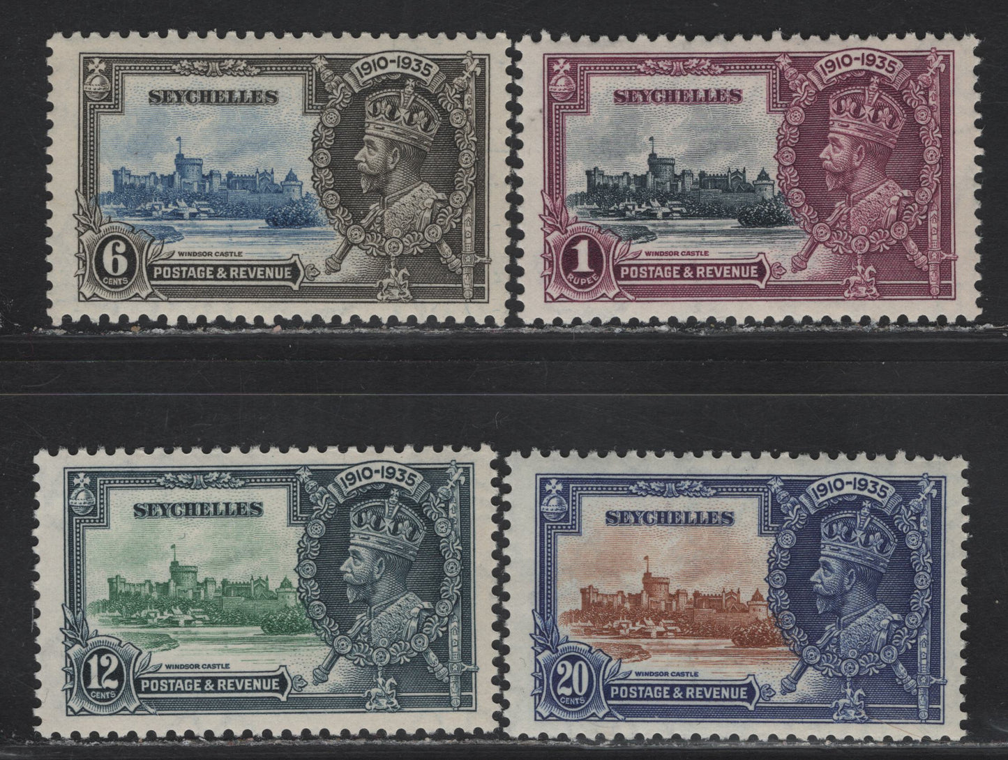 Lot 275 (C) Seychelles SG#128-131 6c - 1r Ultramarine & Gray Black - Slate & Purple KGV & Windsor Castle, 1935 Silver Jubilee Issue, 4 VFNH Singles