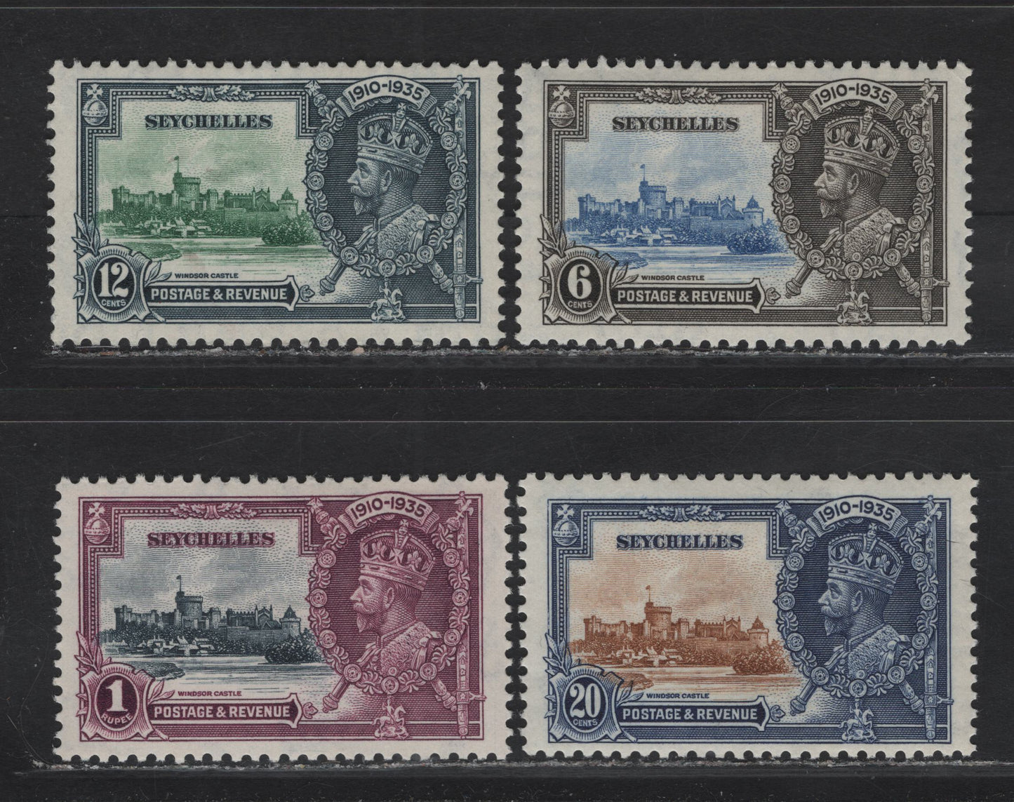 Lot 277 Seychelles SG#128-131 6c - 1r Ultramarine & Gray Black - Slate & Purple KGV & Windsor Castle, 1935 Silver Jubilee Issue, 4 F/VFOG Singles, Basic Hinged Set