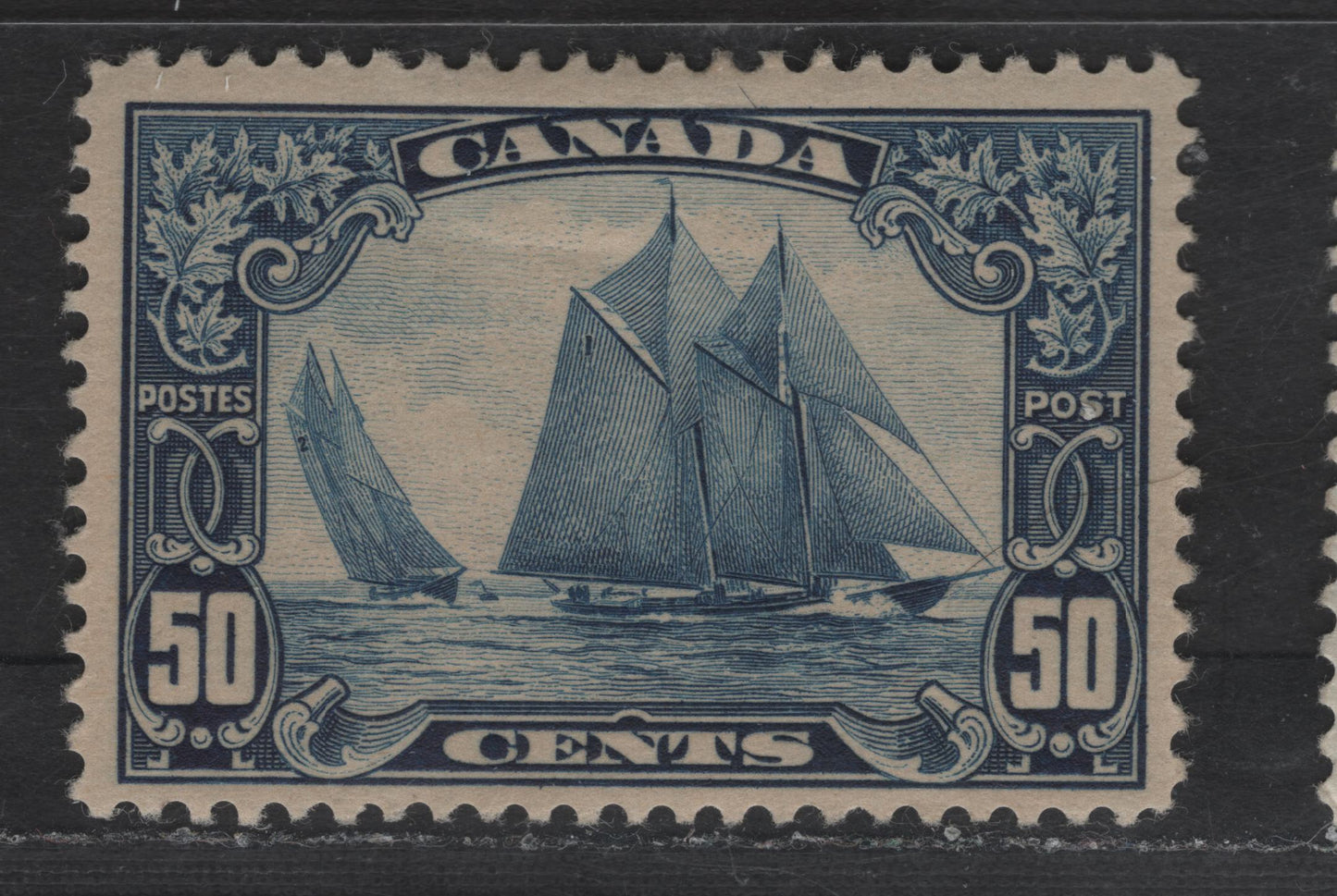 Lot 281 Canada #158 50c Dark Blue Bluenose, 1928-1929 Scroll Issue, A FOG Single, Paper ABN-NNNN