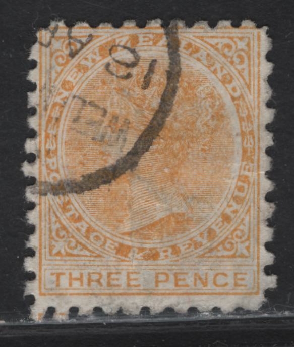 Lot 95 New Zealand (C) SG#221f 3d Pale Orange Yellow Queen Victoria, 1891-1895 Queen Victoria Sidefaces Issue, A Good Used Single, Perf 10, Brown Purple Advert, Vertical Crease Visible From Front.