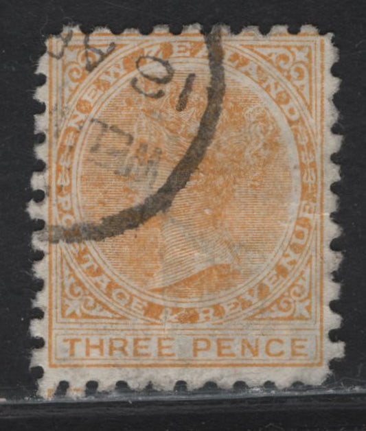 Lot 95 New Zealand (C) SG#221f 3d Pale Orange Yellow Queen Victoria, 1891-1895 Queen Victoria Sidefaces Issue, A Good Used Single, Perf 10, Brown Purple Advert, Vertical Crease Visible From Front.