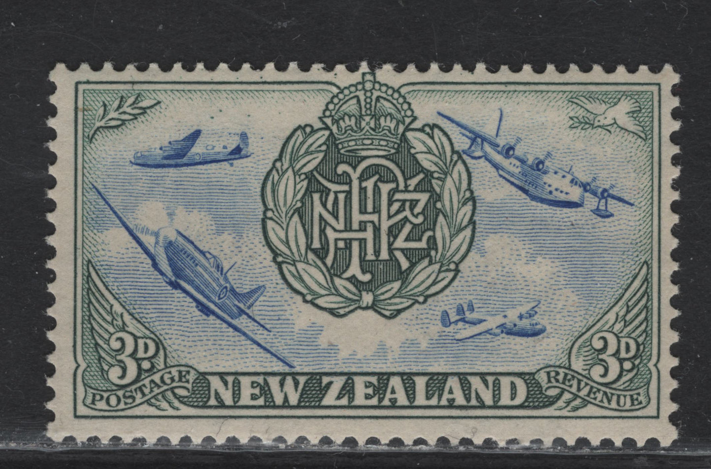 Lot 329 New Zealand (C) SG#671 3d Ultramarine & Deep Slate Green R.N.Z.A.F Badge & Aircraft, 1946 Peace Issue, A FOG Single, Showing Completed Rudder