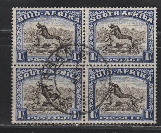 Lot 100 South Africa (C) SG#120a 1/- Blackish Brown & Ultramarine Pictorials, 1947-1954 Pictorial Issue, A Very Fine Used Block Of 4, October 31 1952 Durban CDS