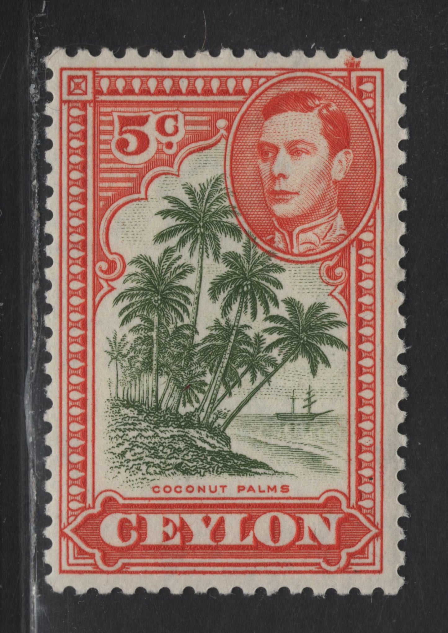 Lot 139 Ceylon (C) SG#387g 5c Sage Green & Orange King George VI, 1938-1952 KGVI Pictorial Issue, A FOG Single, Perf 12x13, Large Burr In UL Corner, Very Unusual On A De La Rue Printing, Very Likely Constant.