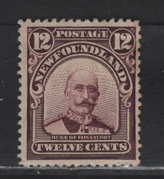 Lot 134 Newfoundland #113 12c Dark Plum, 1911 Royal Family Issue, A FOG Single On Paper WM-C, Line Perf 14.2. This Shade Is Quite A Bit Darker Than Lot 133