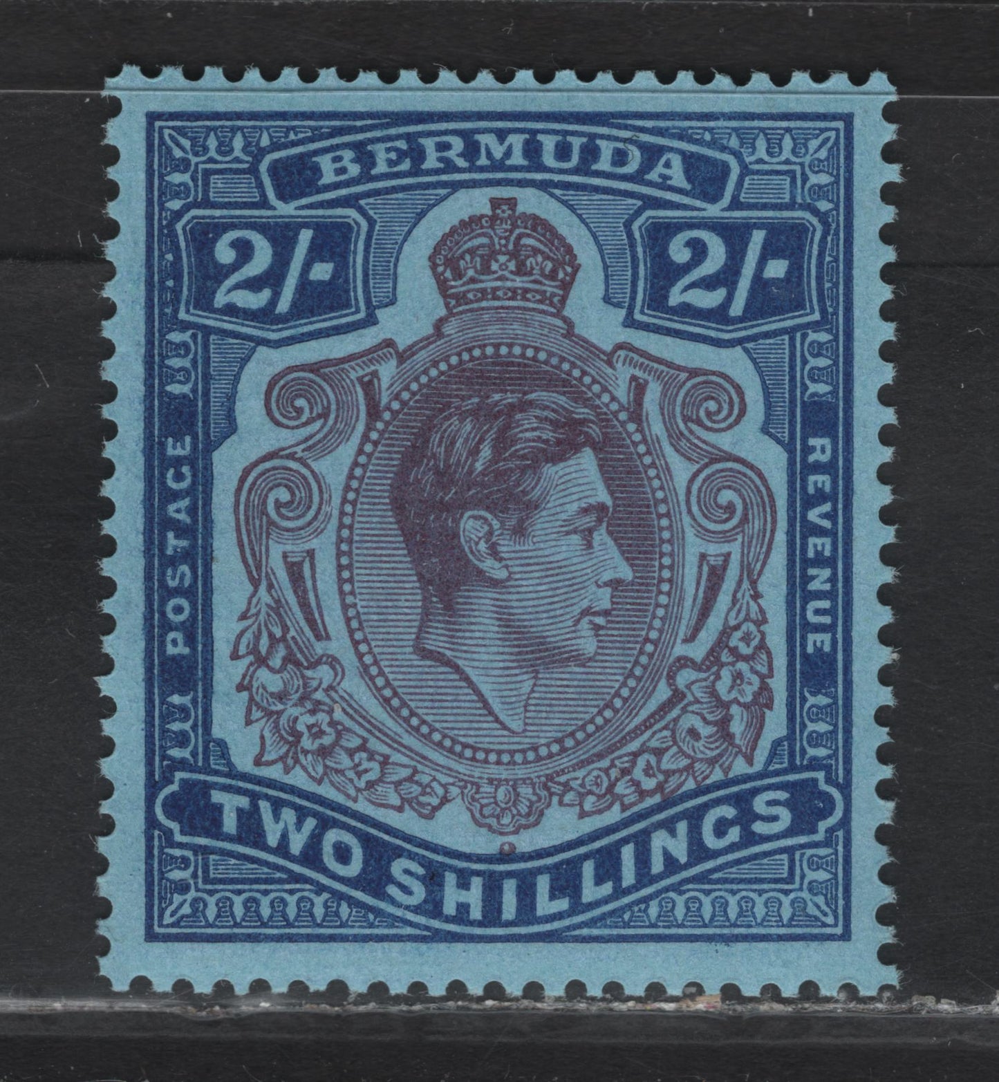 Lot 102 Bermuda SG#116d 2/- Purple & Deep Blue on Pale Blue King George VI, 1938-1953 KGVI Pictorial Issue, A VFNH Single, Perf 14, Ordinary Paper, March 1943 Printing.