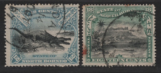 Lot 135 North Borneo (C) SG#106b, 108 12c - 18c Black & Dull Blue - Black & Green Landscapes, 1897-1902 Waterlow Pictorial Issue, 2 Fine Used Singles, Postally Used Examples, Red Smudge On 18c Looks Like Cancellation Ink