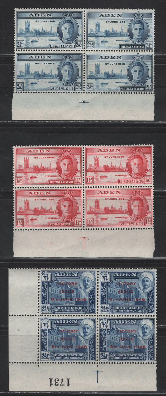 Lot 103 Aden - Qu'aiti State Of Shihr & Mukalla (C) SG#28-29, 13 1.5a - 2.5a Blue , 1946 Victory Issues, 3 F/VFNH/OG Margin Blocks Of 4, Showing Perforation Guide Marks That Denote The Center Column of Perforations In The Sheet