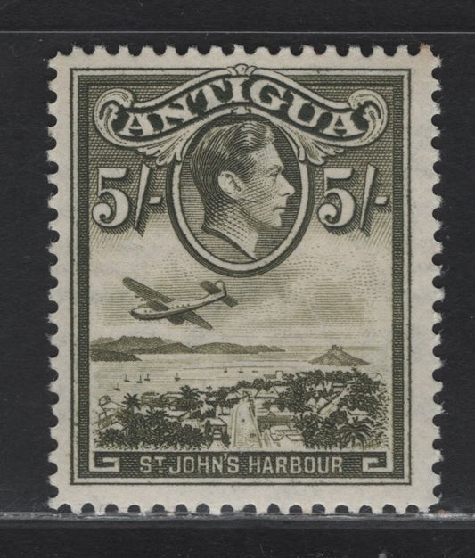 Lot 136 Antigua (C) SG#107 5/- Olive Green , 1938-1951 KGVI Pictorial Issue, A VFOG Single, 1942 Printing On Opaque Paper With Crackly Gum & Faintly Visible Wmk