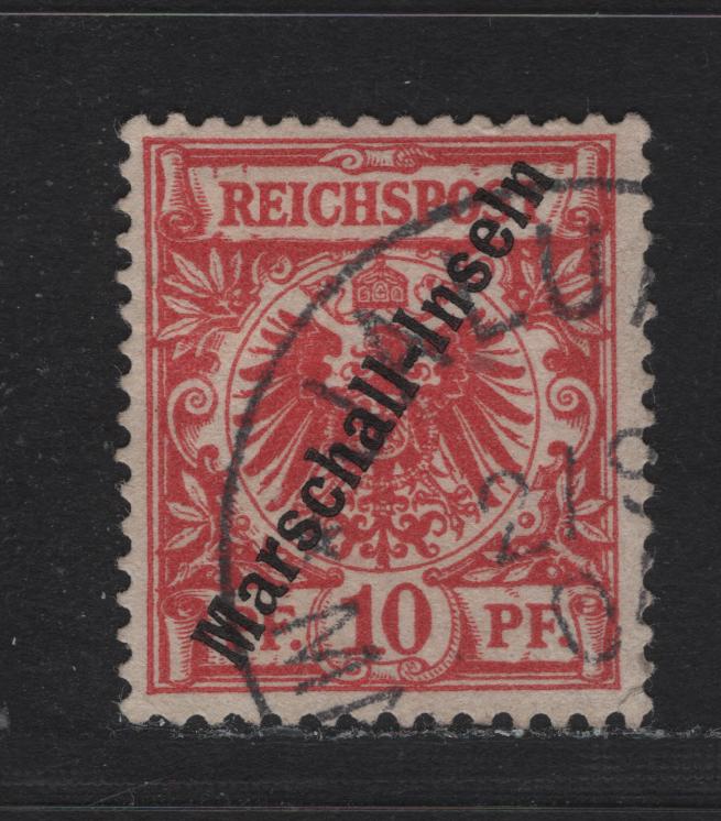 Lot 135 Marshall Islands SC#3 10pf Carmine , 1897 Arms Issue, A Very Good Used Single, Berlin Overprint, Forged Cancel, Small Corner Crease (LR Corner).