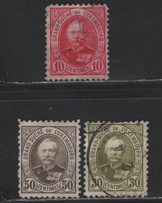 Lot 32 Luxembourg SC#60, 64, 66 (Michel# 57A, 61D, 63D) 10c - 50c Carmine - Brown , 1891-1893 Grand Duke Adolphe Issue, 3 Fine/Very Fine Used Singles, Perfs 11.5 (10c) & 11