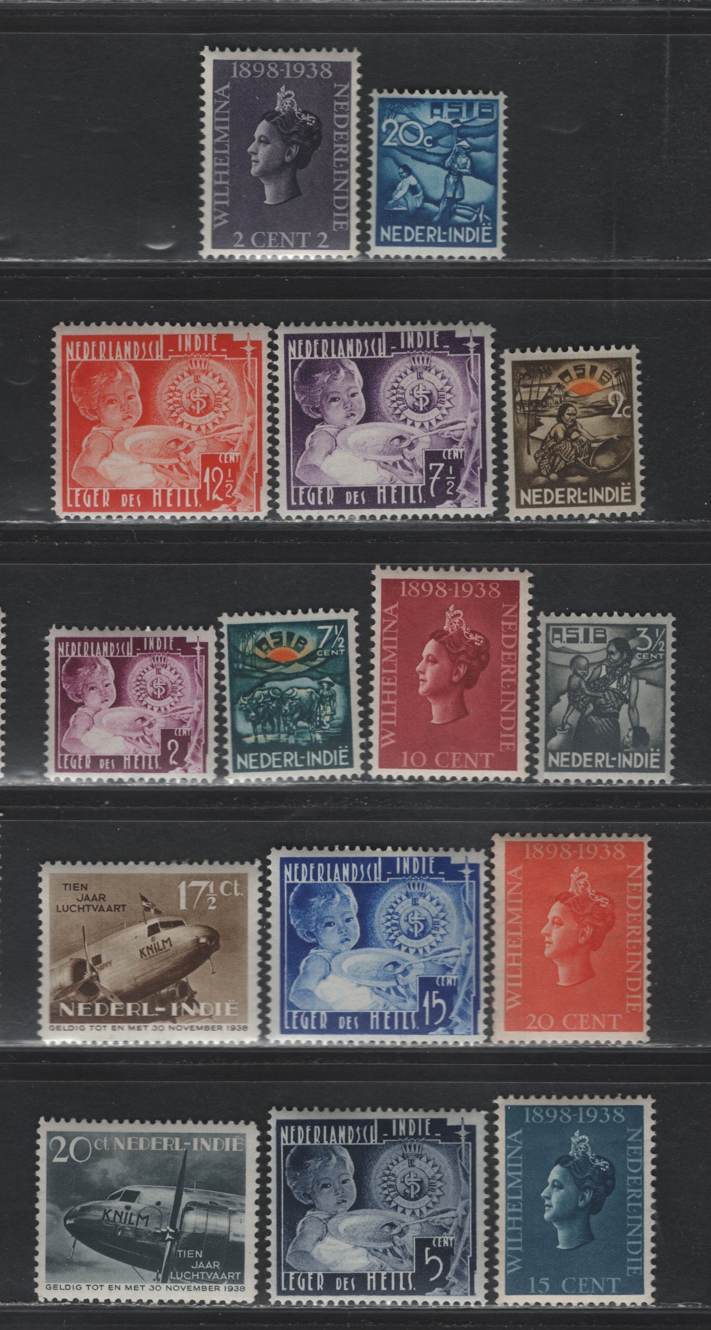 Lot 219 Netherlands Indies SC#196-199, B32-B34, B36-B36B, B25-B29 2c - 20c+5c Dull Purple - Slate , 1938 40th Anniv of Wilhelmina's Reign - 10th Anniv of KLM Issues, 15 F/VFOG Singles