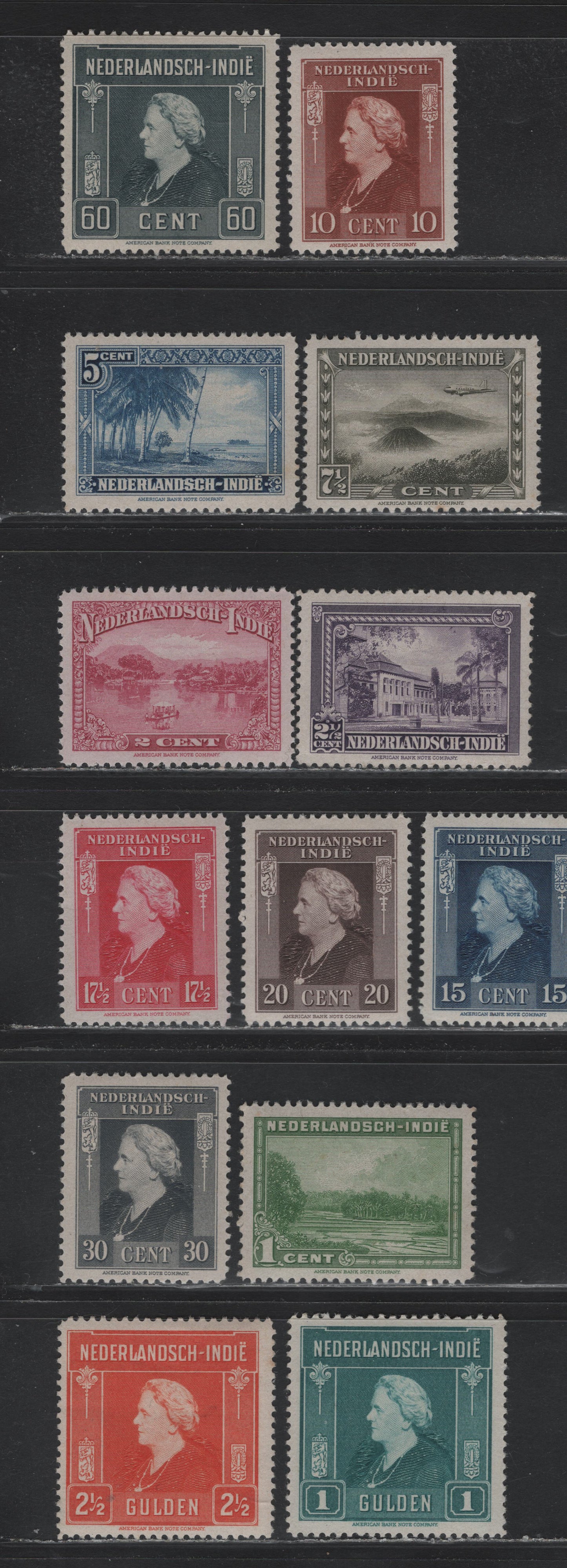 Lot 227 Netherlands Indies SC#250-262 1c - 2.5c Green - Red Orange , 1945-1946 Pictorial & Queen Wilhelmina Issues, 13 F/VFOG/NH Singles, 250, 257-258 & 261 are NH