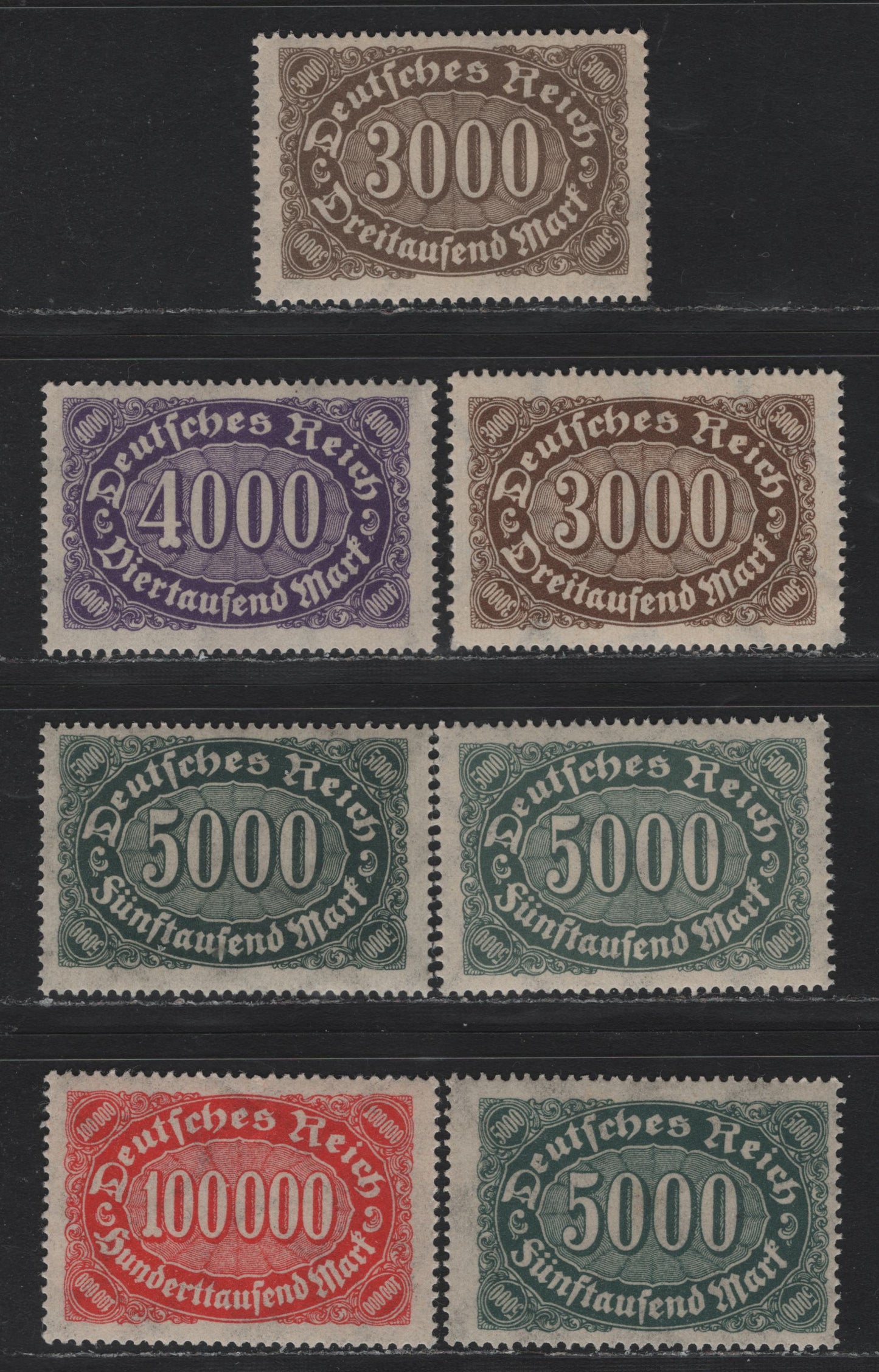 Lot 115 Germany SC#206,b, 207-209 (254b-c, 255, 256a-b, 257) 3000m - 100,000m Gray Brown - Vermillion , 1923 Numeral Issue, 7 F/VFNH Singles