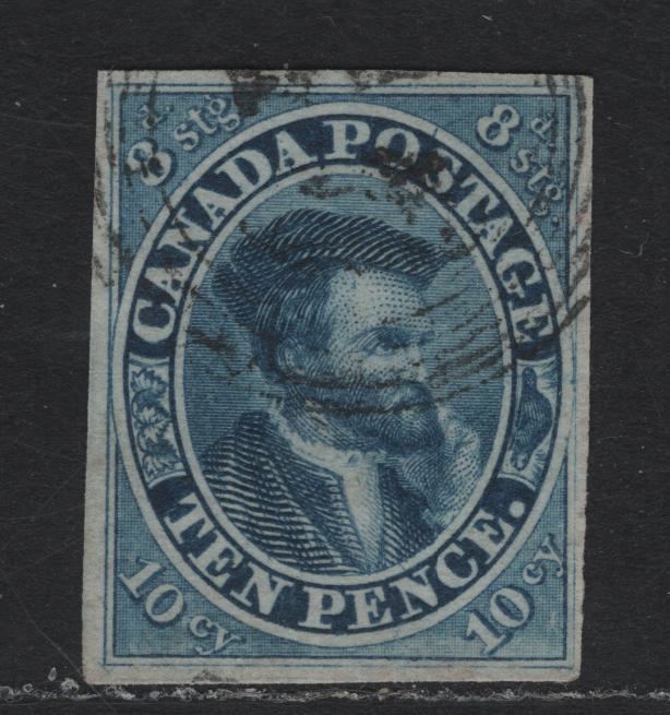 Lot 154 Canada (C)  #7a 10d Blue Jacques Cartier, 1852-1857 Pence Issue, A Fine Used Single, Thicker Opaque White Paper With Horiz Mesh, Fully Clear margins On All Sides, Light 4 Ring Cancel (Might Be #44 Smiths Falls).