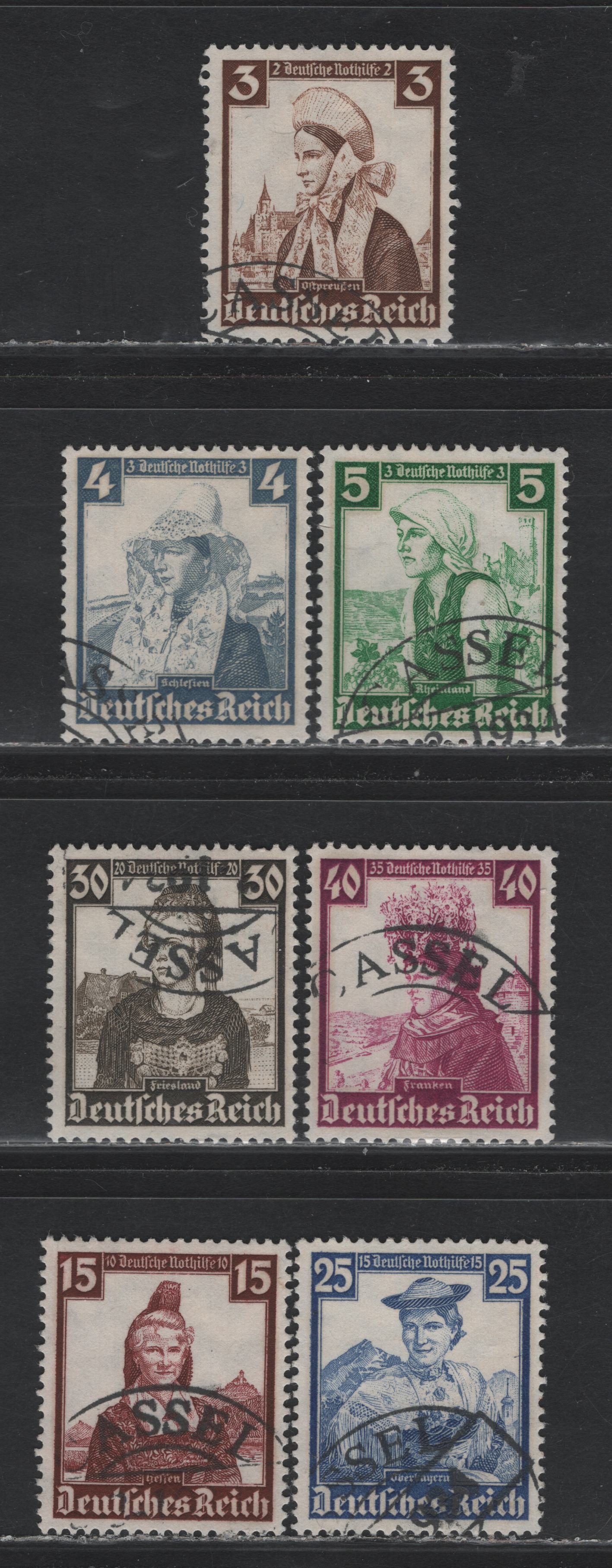 Lot 196 Germany SC#B69-B71, B75-B78 (588-590, 594-597) 3pf+2pf - 40pf+35pf Dark Brown - Plum , 1935 Costumes Semi Postal Issue, 7 Very Fine Used Singles, All With What Appears To Be A Forged Cassel CDS Cancel