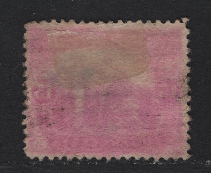 Lot 242 Newfoundland #114 15c Bright Magenta, 1919 Trail of the Caribou Issue, A Fine Used Single, WM-E Paper, Line Perf 14, The Color I Believe, Has Been Chemically Affected.
