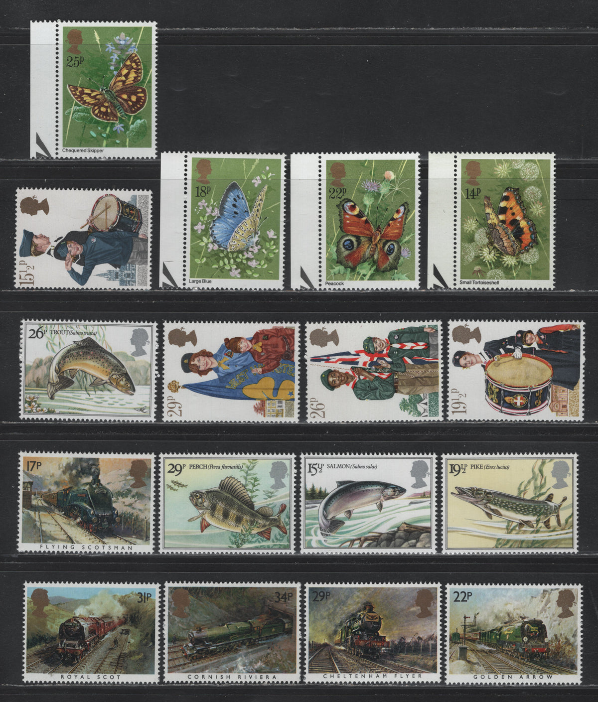 Lot 48 Great Britain SG#941-944, 983-986, 1011-1014, 1093-1097 14p - 34p Multicolored , 1981-1985 Butterflies - Trains Issues, 17 VFNH Singles