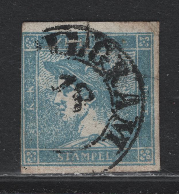 Lot 223 Austria Scott#P1b 0.6kr Light Blue , 1867-1873 Newspaper Issue, A Good Used Single, Ribbed Paper, Large Sealed Tear At Top, Concealed By The Postmark, Whuch May Not Be Genuine, Therefore Valued As Unused.