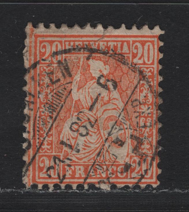 Lot 66 Switzerland Scott#64 20c Orange , 1862-1878 Sealted Helvetia Issue, A Good Used Single, Granite Paper, Small Tear At Top & Light Diagonal Crease At LR