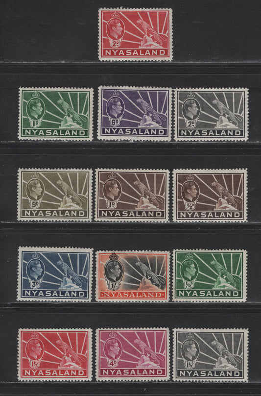 Lot 386 Nyasaland (C) Gibbons#130-138 1/2d - 1/- Green - Black & Orange , 1938-1944 KGVI Symbol of the Protectorate Issue, 13 F/VFOG/RG Singles, 1.5d Key Carmine Value Is OG But All Others Apear To be Regummed