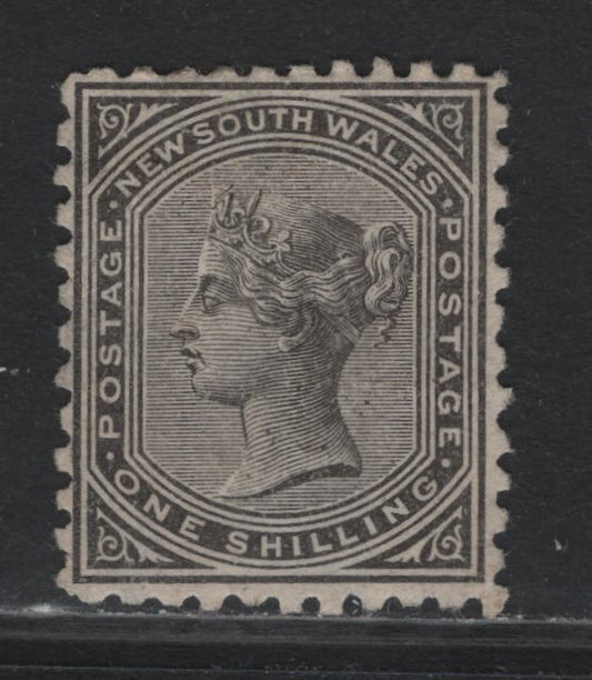 Lot 318 Australia - NSW SG#237a 1/- Black , 1882-1897 Surface Printed Queen Victoira Issue, A Very Fine Unused Single, Well Centered, Wmk Large Crown & NSW, Very Seldom Found With Centering And Perfs Like This.