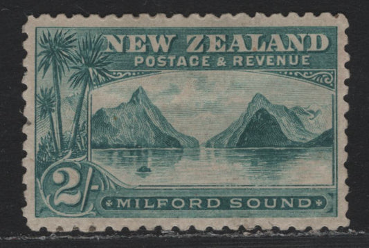 Lot 330 New Zealand SG#269 2/- Blue Green , 1899-1903 Pictorial Issue, A VFOG Single, Pirie Paper, Perf 11, Very Light Corner Bend At LR That Is Not A Full Crease, Beautifully Centered For This Issue.