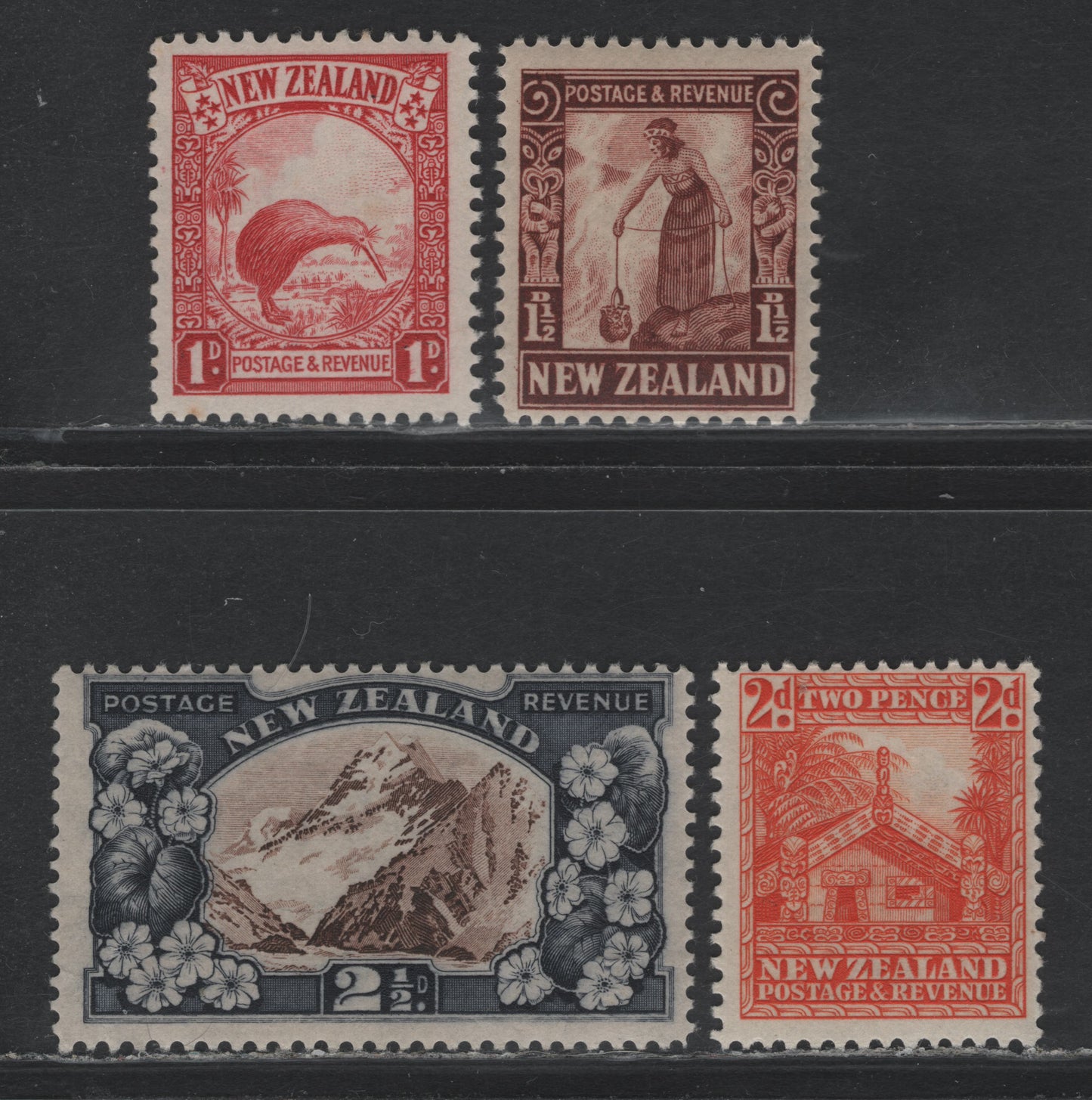 Lot 362 New Zealand SG#557, 558a, 559, 560b 1d - 2.5d Scarlet - Chocolate & Slate , 1935-1936 Pictorial Issue, 4 FOG Singles, Single Star & NZ Wmk, Perfs 14x13.5 (1d & 2d) and 13.5x14 (1.5d & 2.5d)