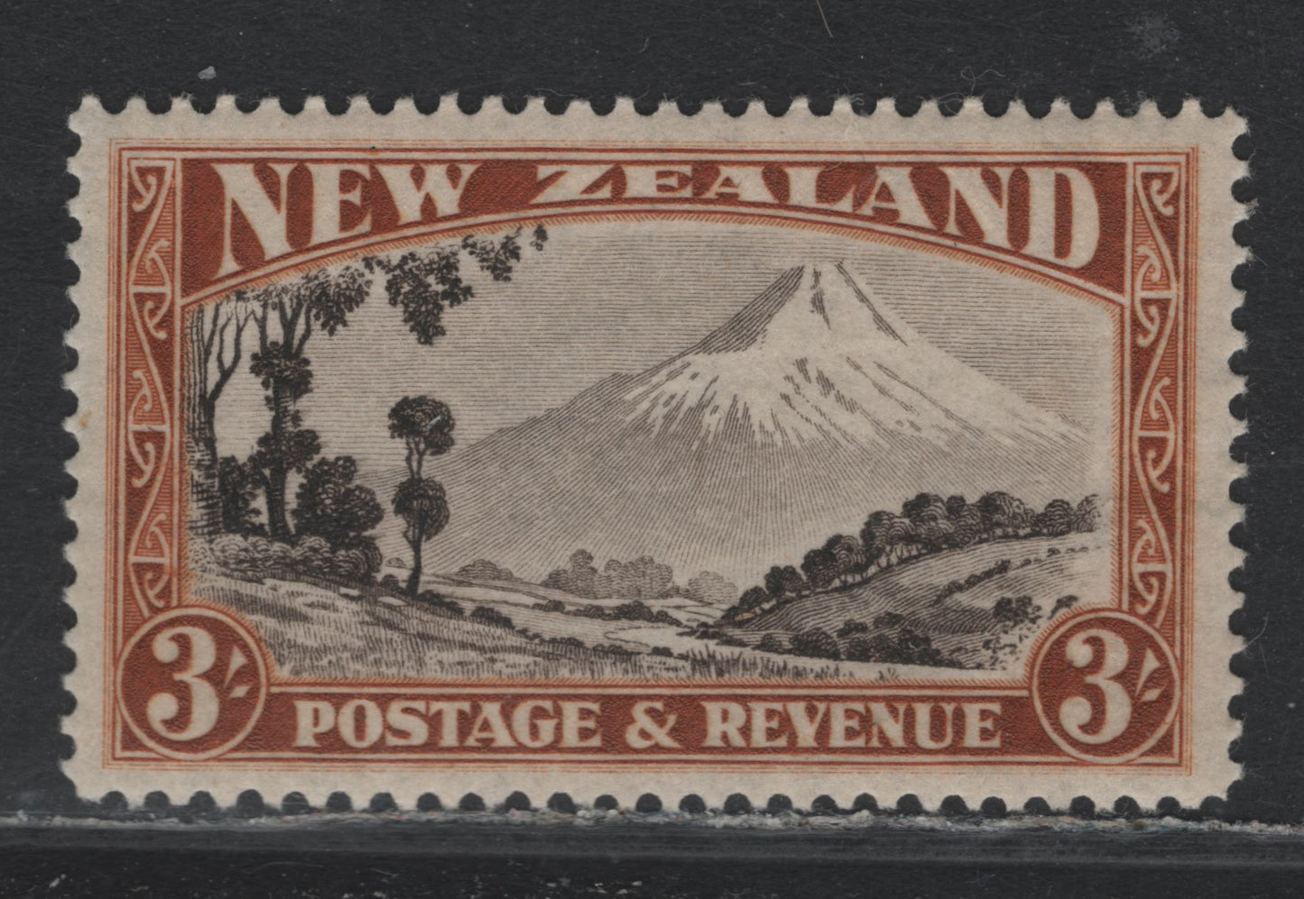 Lot 368 New Zealand SG#569a 3/- Chocolate & Yellow Brown , 1935-1936 Pictorial Issue, A VFOG Single, Perf 13.5x13.8, 1935 Printing