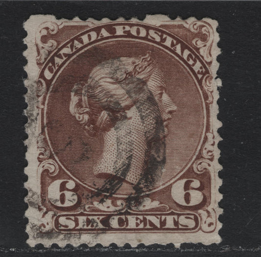 Lot 333 Canada #27v 6c Brown , 1868-1876 Large Queen Issue, A Fine Used Single, Soft Opaque Paper (FO-R), Plate 1 Printing, #3 2 Ring Cancel For Quebec, Perf 12.2x12.1, This is a Scarcer Paper Type Compared To The More Common Types.