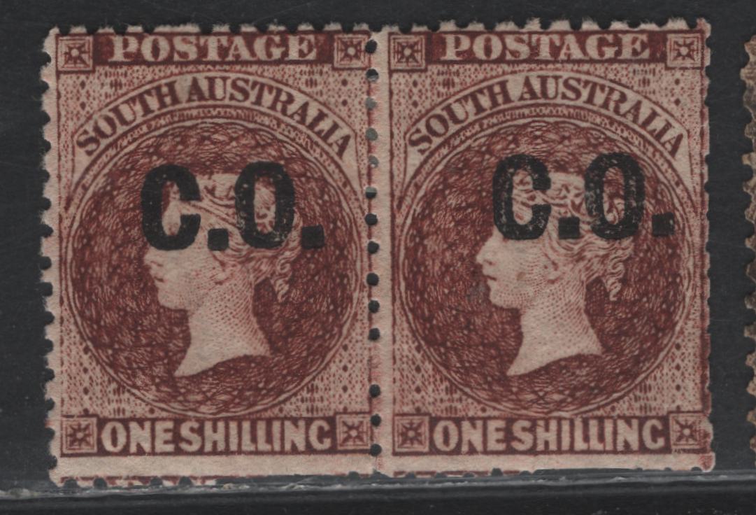 Lot 123 Australia - South Australia SG#80var 1/- Lake Brown , 1868-1879 Humphreys Head Issue, A VGOG Pair, Perf 11.5-12.5, Black CO Overprint, Perf Slightly Clipped At Base, Very Rare Mint Pair.