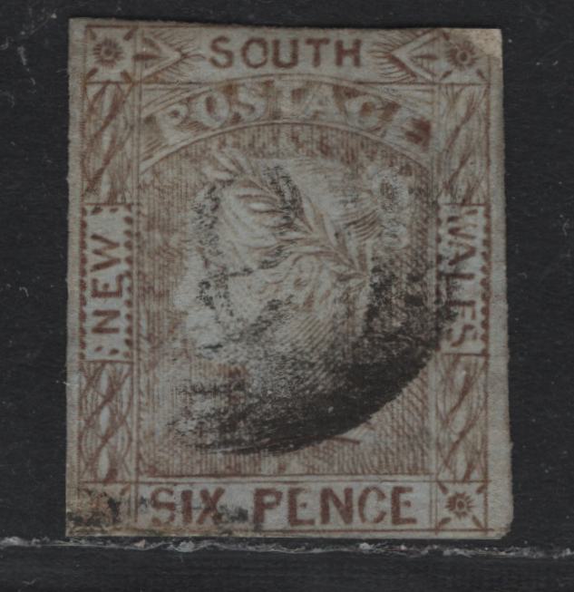 Lot 307 Australia - NSW SG#73 6d Vandyke Brown , 1852-1853 Laureate Issue, An Ungraded Used Single, Medium Bluish Wove Paper, Expertly Repaired By Adding To The Lower left & Upper Right, Where The Design Was Cut Away.