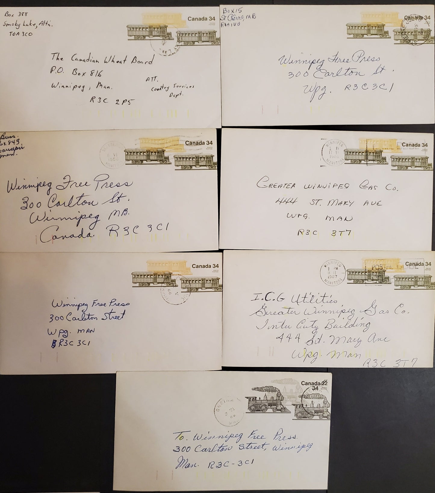 Lot 334 Canada #U116, U118 34c on 32c, 34c Multicoloured Trains & Railcars, 1982-1989 Transportation Issue, 6 VF Used Postal Stationery Envelopes Different Paper Fluorescences & Tag Bar Lengths