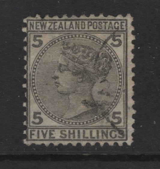 Lot 343 New Zealand (C) SG#186 5/- Gray Queen Victoria, 1874-1878 First Sideface Issue, A Very Good Used Single, Comb Perf 12x11.5, Nice Face-Free Cancel And Attractive Perfs, Unfortunately There Is A Sealed Horizontal Cut Through Postage.