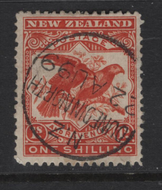 Lot 353 New Zealand (C) SG#257 1/- Vermillion Kea & Kaka, 1898 Pictorial Issue, A Very Fine Used Single, Perf 16, Unwatermarked, August 22 1899 Dunedin North CDS.