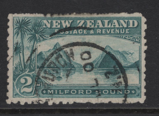 Lot 358 New Zealand (C) SG#269 2/- Blue Green Milford Sound, 1899-1903 Pictorial Issue, A Fine Used Single, Perf 11, Thick, Soft Pirie Paper, Unwateramrked.