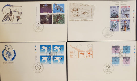 Canada #1098a, 11029, 1110, 1112a 34c Multicoloured Various Subjects, 1986 Calgary Olympics Issues, 4 VF Official Canada Post FDC's Franked With Inscription Blocks, DF, LF & MF  Envelopes, DF & MF Papers