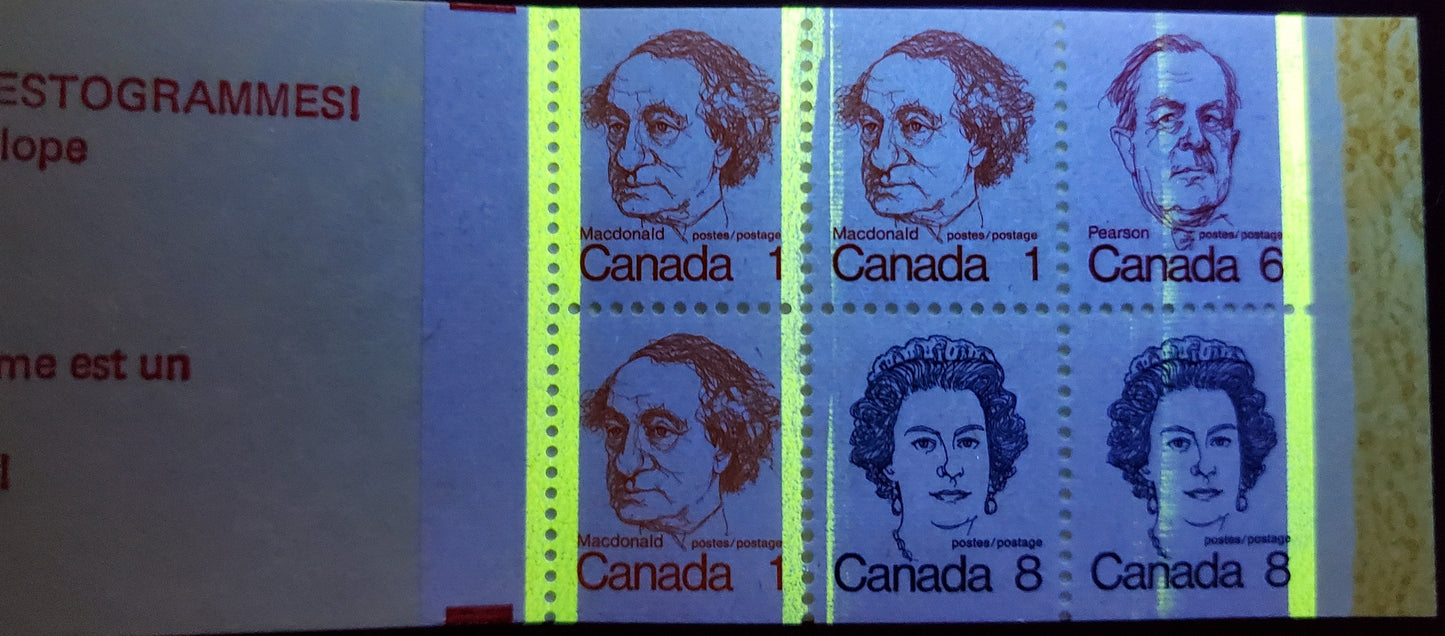 Canada #BK74gT3 1c, 6c, 8c Orange - Royal Blue 1973-1978 Caricature Issue, A VFNH Complete Booklet DF Cover, LF Horizontal Ribbed Pane, Self-Sealer, 1 tag Bar Damaged Along Length, One Tag Bar Missing, Very Faint Ghost Tag Down 1/3 and 2/3