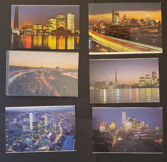 Group Of 6 Canadian Postcards Featuring Scenes Of Toronto, Ontario At Night From Different Angles. Our Estimated Value Is $6.