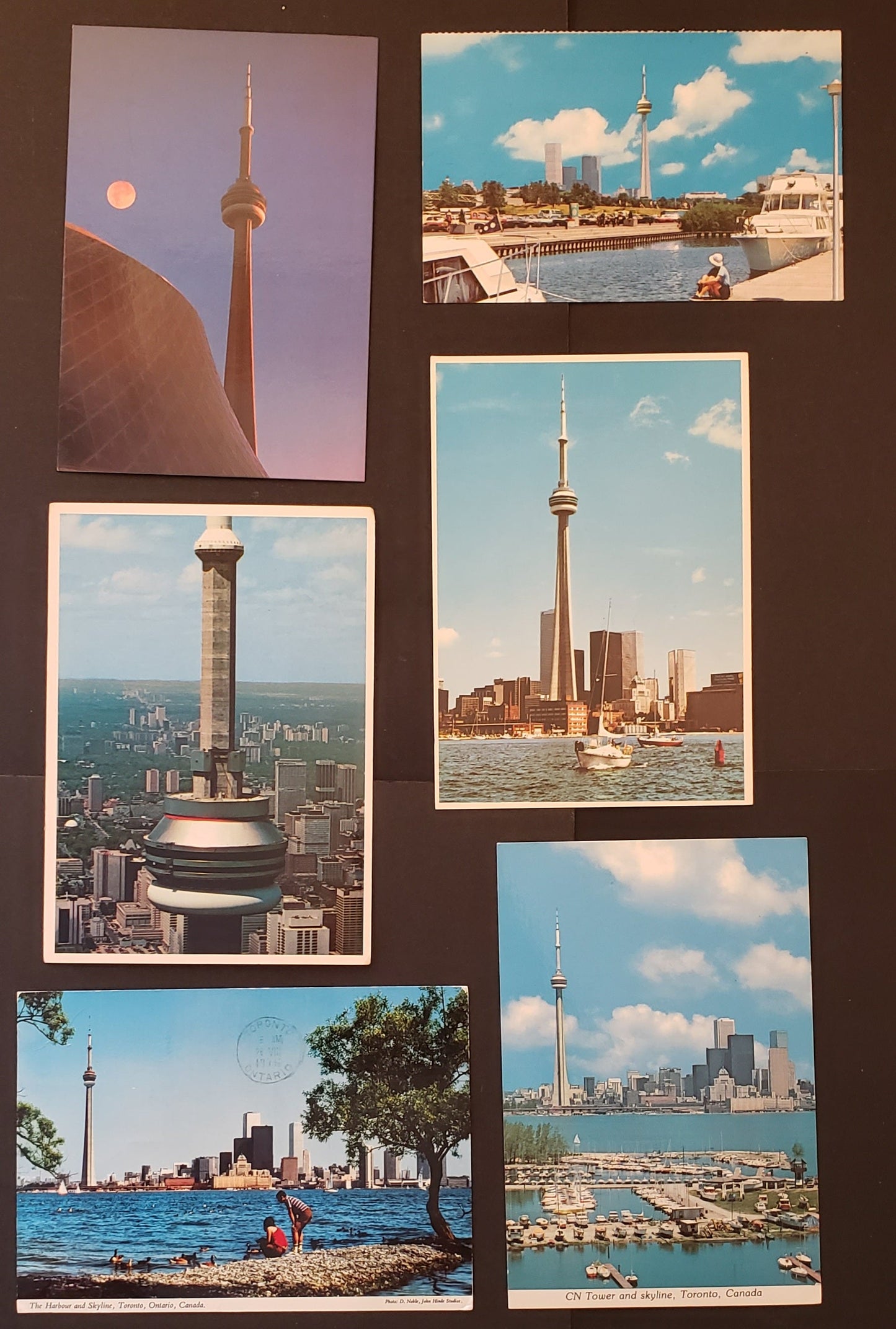 Group Of 6 Canadian Postcards Featuring Scenes Of The CN Tower From Various Views In Toronto, Ontario. Our Estimated Value Is $6.