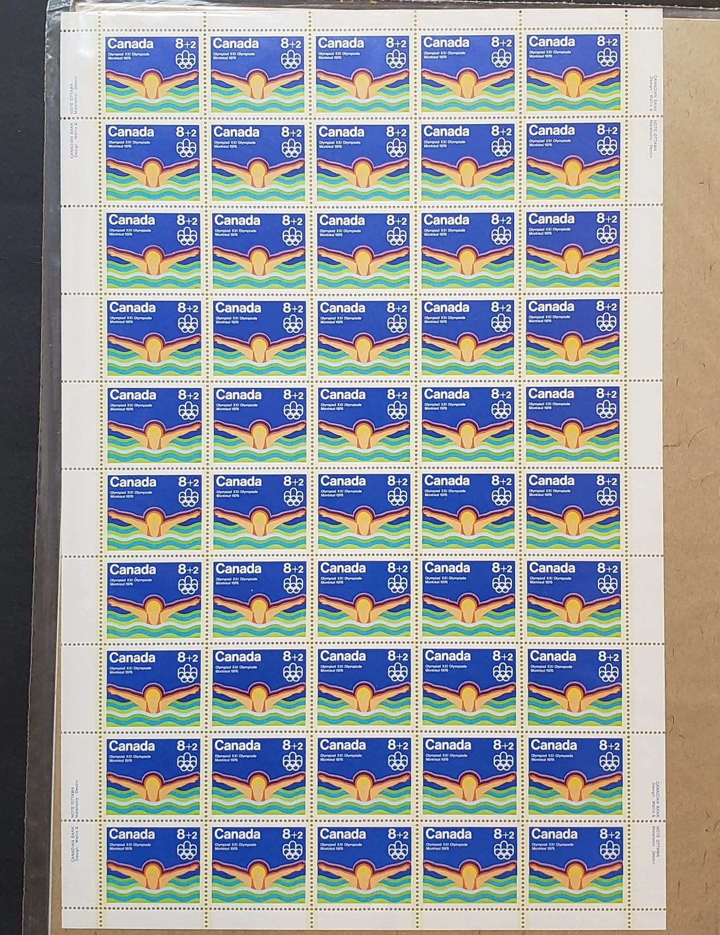 Lot 95A Canada #B4i, ii 8c + 2c Multicoloured Swimmer, 1975 Montreal Olympic Games Issue, Philatelic Stock Sheet Of 50, LF/LF Smooth Paper, VF-84 NH, Unfolded,  Unitrade Cat. As Singles $158, Sealed In Pack With Type 1 Insert, Red Dot On Forearm