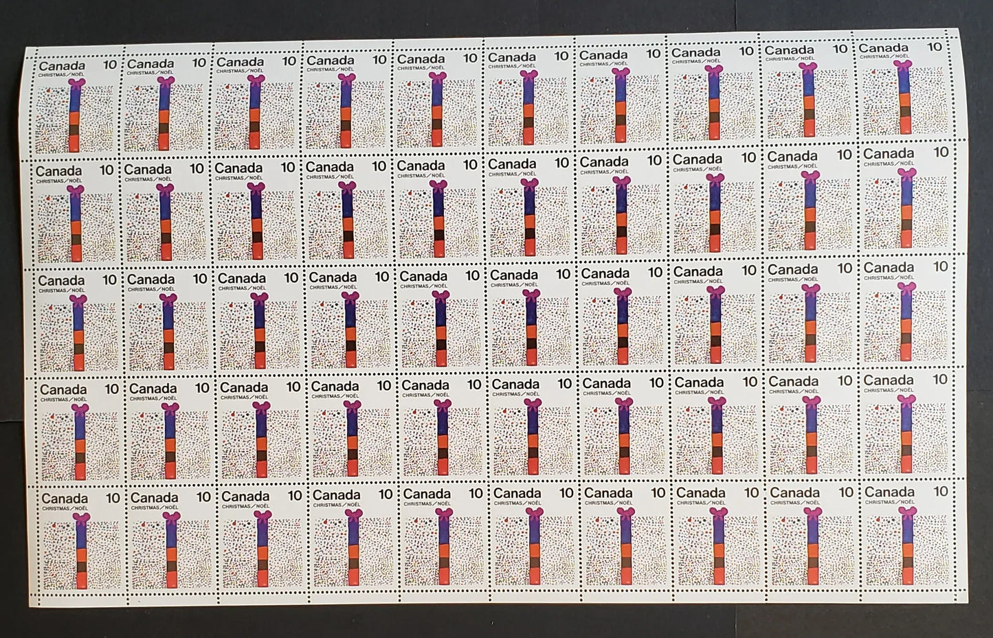 Lot 99 Canada #678 10c  Multicoloured Gift, 1975 Christmas Issue, Field Stock Sheet Of 50, MF/HF Smooth Paper, VF-80 NH, Unfolded,  Unitrade Cat. As Singles $17.5,