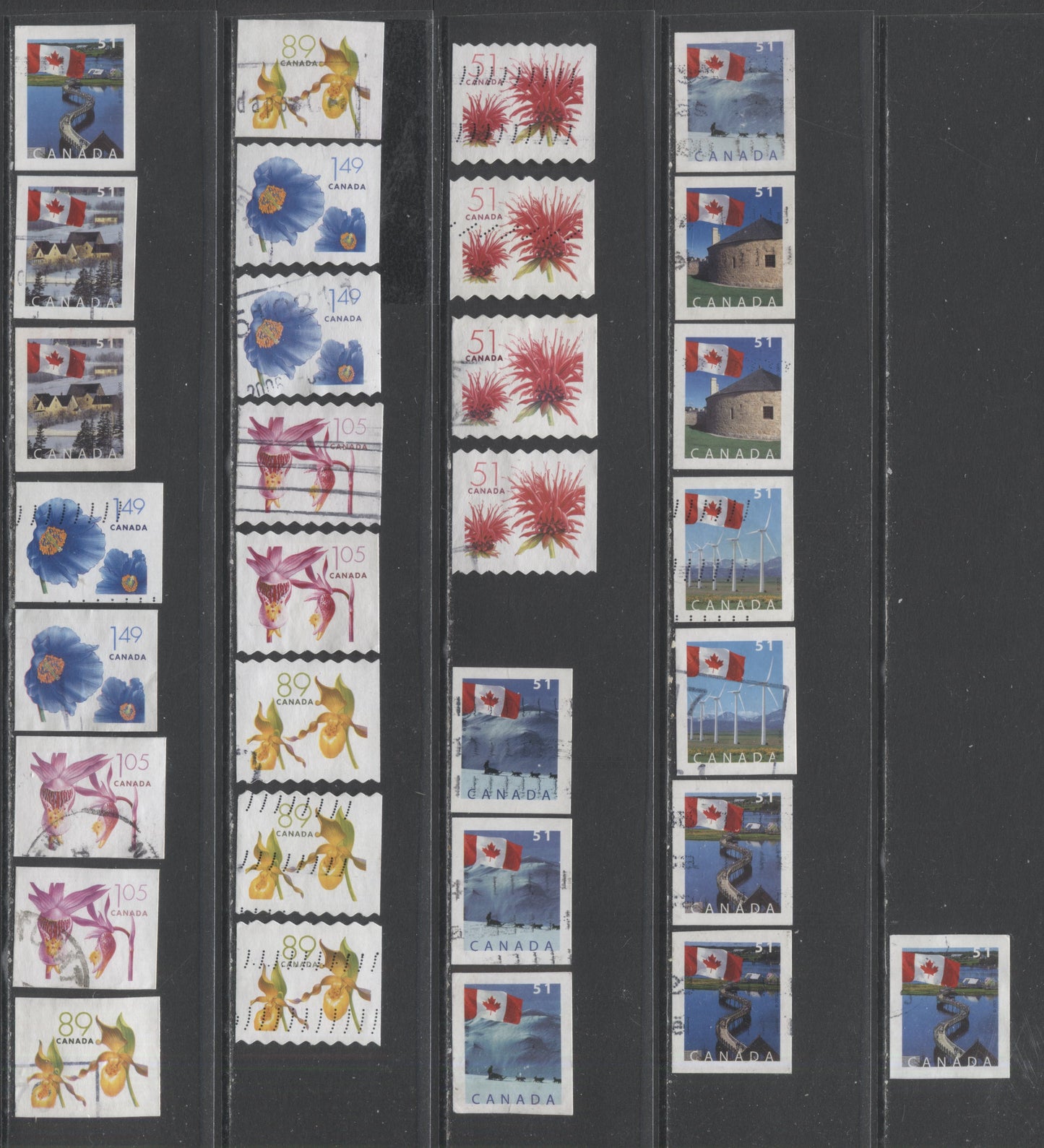Lot 35 Canada #2128/2139i 51c-$1.49 Multicolored Red Bergamot, Flag Over Dogsled, 2005 Flower Definitives (2) - Coils, Flag Booklet, 31 Very Fine Used Singles On Different Papers And Tags $15.10