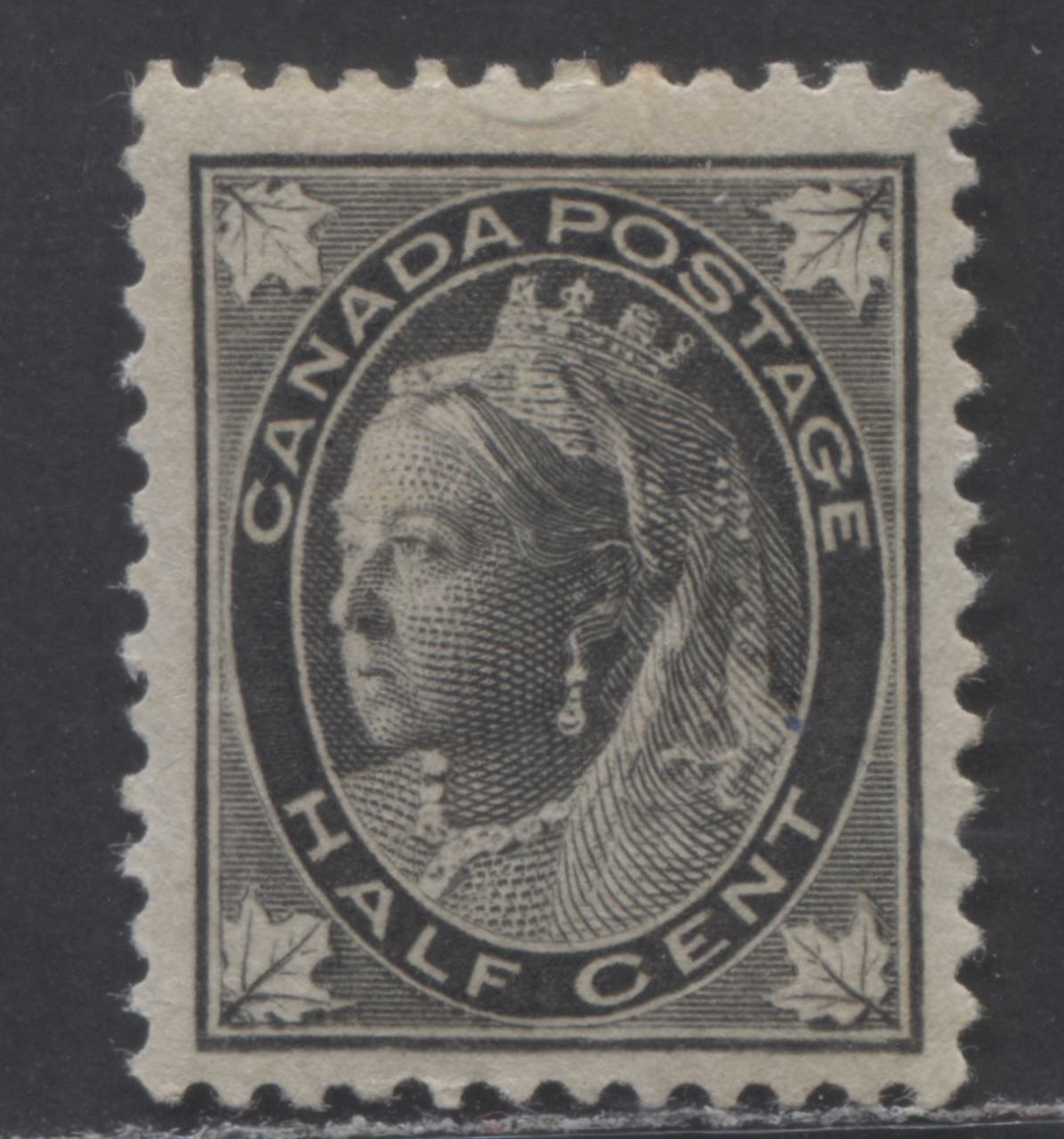 Lot 69 Canada #66 1/2c Black Queen Victoria, 1897-1898 Maple Leaf Issue, A VFOG Single On Vertical Wove Paper, Minor Re-entry